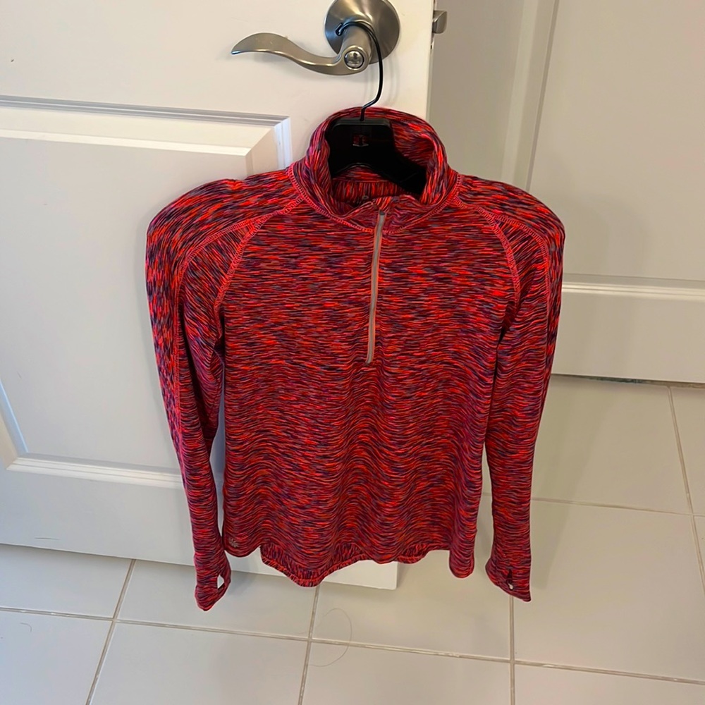 Athleta mock neck long-sleeved wicking top.